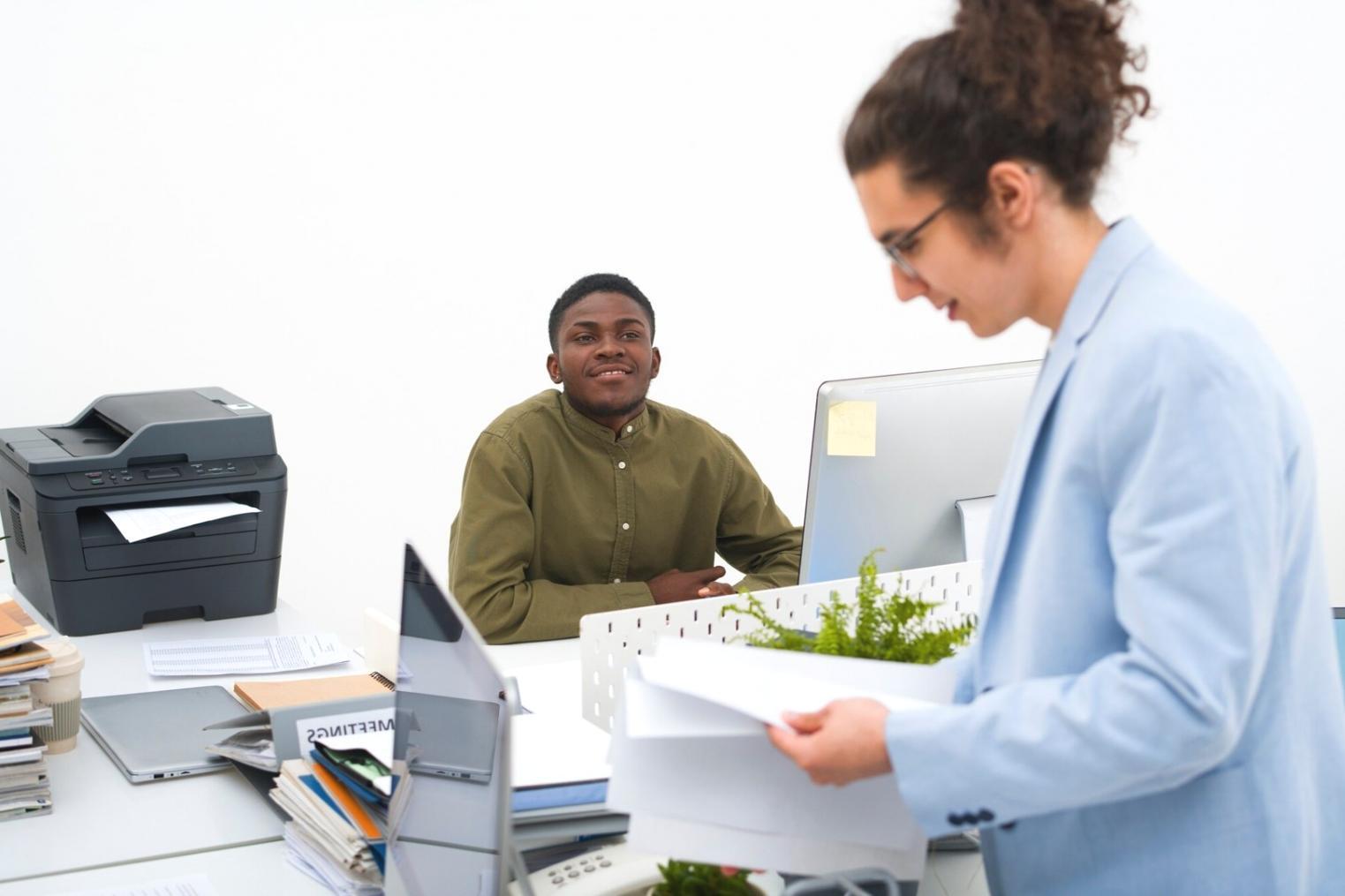 Student analyzing financial charts and data on computer screen